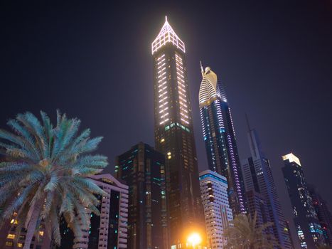 Night view of Dubai Downtown with skyscrapers