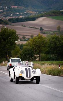 CAGLI , ITALY - OTT 24 - 2020 : BMW 328 1939 on an old racing car in rally Mille Miglia 2020 the famous italian historical race (1927-1957)