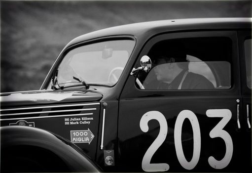 CAGLI , ITALY - OTT 24 - 2020 : FIAT 1099 MUSONE 1947 on an old racing car in rally Mille Miglia 2020 the famous italian historical race (1927-1957)