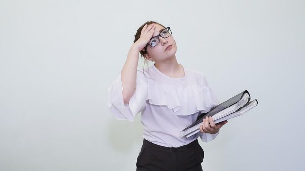 A schoolgirl in glasses depicts a successful girl with notes. A student depicts a reverie. The solution of the problem