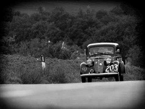 CAGLI , ITALY - OTT 24 - 2020 : FIAT 1099 MUSONE 1947 on an old racing car in rally Mille Miglia 2020 the famous italian historical race (1927-1957)