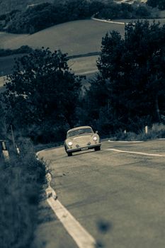 CAGLI , ITALY - OTT 24 - 2020 : PORSCHE 356 1500 SUPER COUPÉ 1953 on an old racing car in rally Mille Miglia 2020 the famous italian historical race (1927-1957)