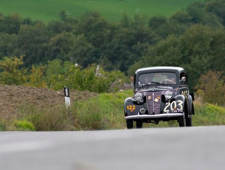 CAGLI , ITALY - OTT 24 - 2020 : FIAT 1099 MUSONE 1947 on an old racing car in rally Mille Miglia 2020 the famous italian historical race (1927-1957)