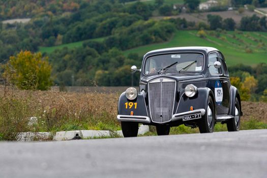 CAGLI , ITALY - OTT 24 - 2020 : LANCIA ARDEA 1952 on an old racing car in rally Mille Miglia 2020 the famous italian historical race (1927-1957