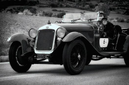 CAGLI , ITALY - OTT 24 - 2020 : O.M. 665 SS MM 1930 on an old racing car in rally Mille Miglia 2020 the famous italian historical race (1927-1957)