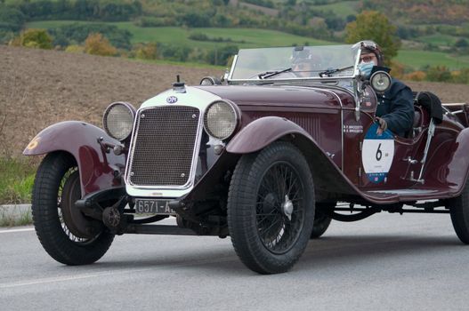 CAGLI , ITALY - OTT 24 - 2020 : O.M. 665 SS MM 1930 on an old racing car in rally Mille Miglia 2020 the famous italian historical race (1927-1957)