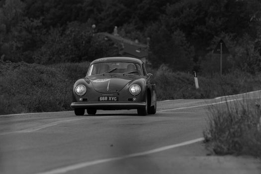 CAGLI , ITALY - OTT 24 - 2020 : PORSCHE 356 A CARRERA 1500 GS 1956 on an old racing car in rally Mille Miglia 2020 the famous italian historical race (1927-1957)