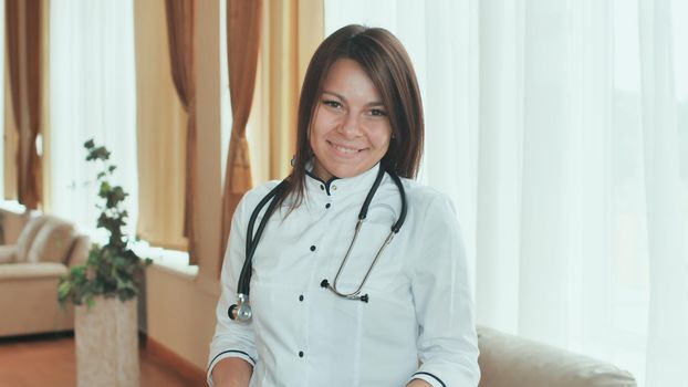 Portrait of a young female doctor in a good mood