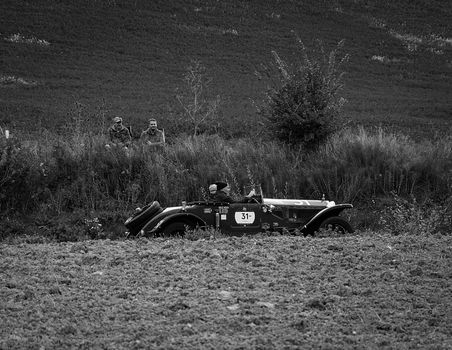 CAGLI , ITALY - OTT 24 - 2020 : LANCIA LAMBDA TIPO 223 CORTO SPIDER 1928 on an old racing car in rally Mille Miglia 2020 the famous italian historical race (1927-1957