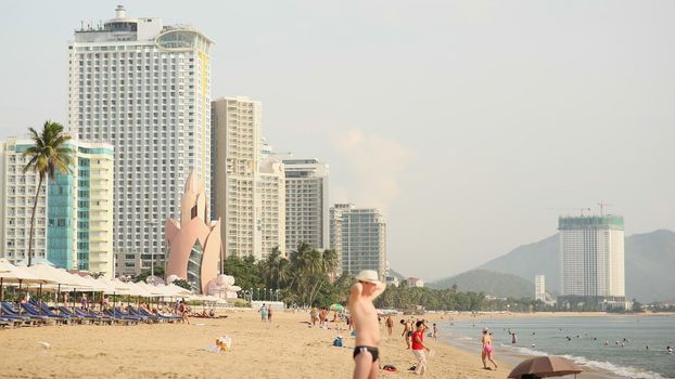 Nha Trang beach with many vacationing tourists. Vietnam. Timelapse