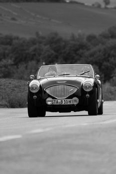 CAGLI , ITALY - OTT 24 - 2020 : AUSTIN HEALEY 100/4 BN2 1956 an old racing car in rally Mille Miglia 2020 the famous italian historical race