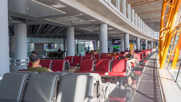 China Airport in Beijing. Terminal airport with passengers waiting for departure.