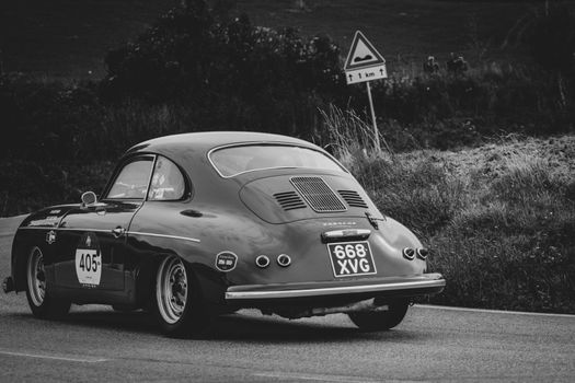 CAGLI , ITALY - OTT 24 - 2020 : PORSCHE 356 A CARRERA 1500 GS 1956 on an old racing car in rally Mille Miglia 2020 the famous italian historical race (1927-1957)