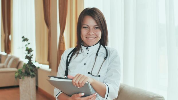 Portrait of a young female doctor in a good mood