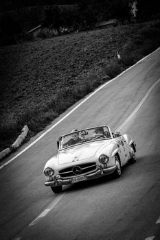 CAGLI , ITALY - OTT 24 - 2020 : MERCEDES-BENZ 190 SL 1956 on an old racing car in rally Mille Miglia 2020 the famous italian historical race (1927-1957