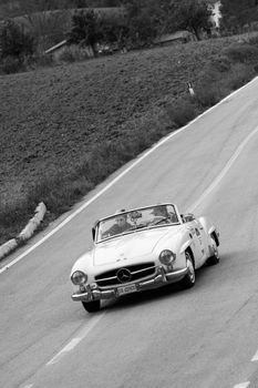 CAGLI , ITALY - OTT 24 - 2020 : MERCEDES-BENZ 190 SL 1956 on an old racing car in rally Mille Miglia 2020 the famous italian historical race (1927-1957