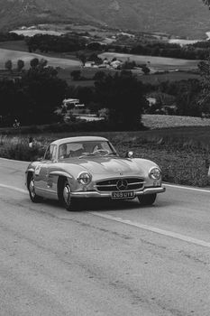 CAGLI , ITALY - OTT 24 - 2020 : MERCEDES-BENZ 300 SL W 198 1955 an old racing car in rally Mille Miglia 2020 the famous italian historical race (1927-1957)