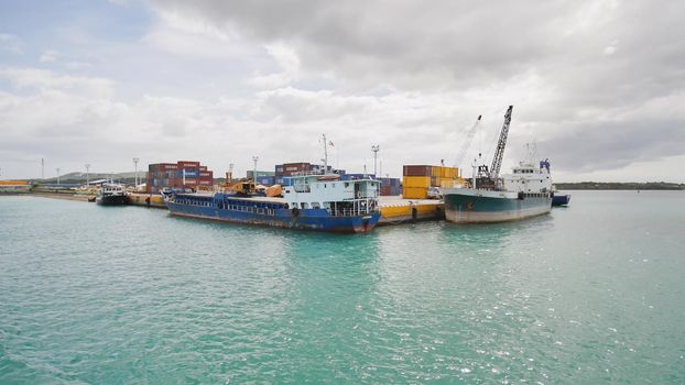 Commodity containers and ships in the port of Taagbilaran. Philippines