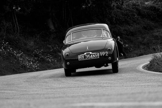 CAGLI , ITALY - OTT 24 - 2020 : SIMCA 9 ARONDE COUPÉ 1952 on an old racing car in rally Mille Miglia 2020 the famous italian historical race (1927-1957)