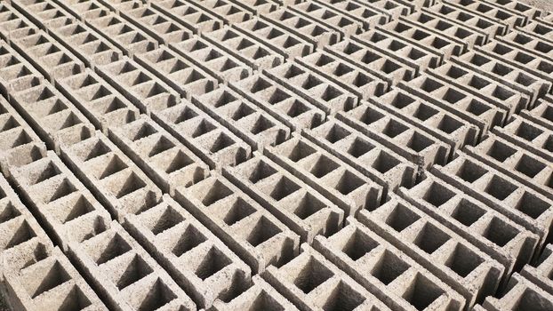 Brick forms. Production of bricks from volcanic ash in the Philippine city of Legazpi. Shooting in motion