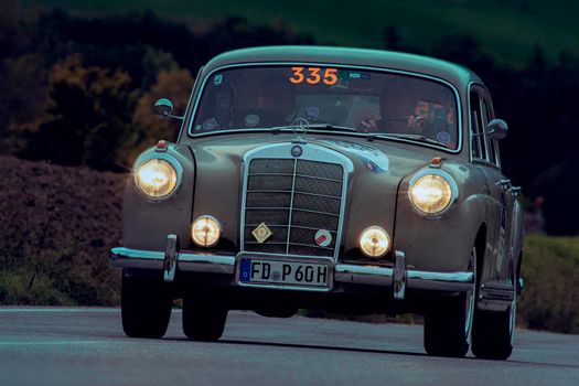 CAGLI , ITALY - OTT 24 - 2020 : MERCEDES-BENZ 220 A 1955 an old racing car in rally Mille Miglia 2020 the famous italian historical race (1927-1957)