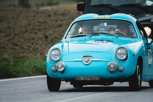 CAGLI , ITALY - OTT 24 - 2020 : ABARTH FIAT 750 BERLINETTA ZAGATO 1957 on an old racing car in rally Mille Miglia 2020 the famous italian historical race (1927-1957)