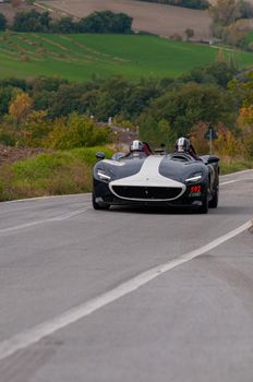 CAGLI , ITALY - OTT 24 - 2020 : FERRARI MONZA MONZA SP1 on an old racing car in rally Mille Miglia 2020 the famous italian historical race (1927-1957)