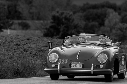 CAGLI , ITALY - OTT 24 - 2020 : PORSCHE 356 1500 SPEEDSTER 1955 on an old racing car in rally Mille Miglia 2020 the famous italian historical race (1927-1957