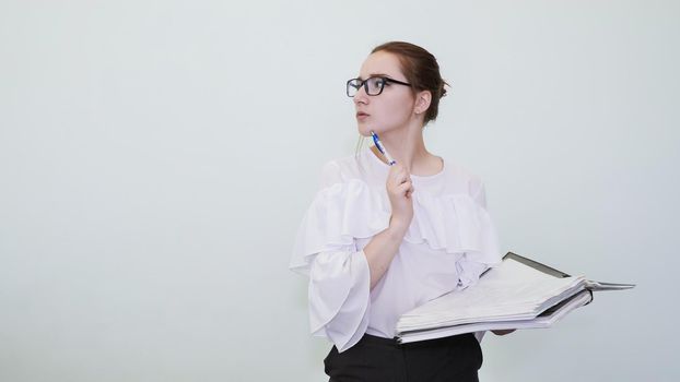 A schoolgirl in glasses depicts a successful girl with notes. A student depicts a reverie. The solution of the problem