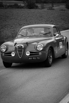 CAGLI , ITALY - OTT 24 - 2020 : ALFA ROMEO 1900 C SUPER SPRINT TOURING 1955 on an old racing car in rally Mille Miglia 2020 the famous italian historical race (1927-1957)