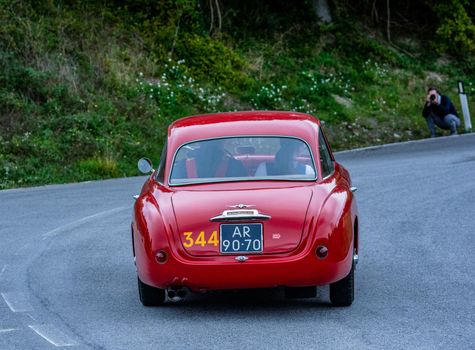 CAGLI , ITALY - OTT 24 - 2020 : ALFA ROMEO 1900 C SUPER SPRINT TOURING 1955 on an old racing car in rally Mille Miglia 2020 the famous italian historical race (1927-1957)