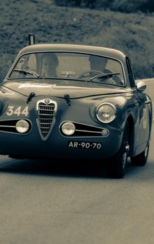 CAGLI , ITALY - OTT 24 - 2020 : ALFA ROMEO 1900 C SUPER SPRINT TOURING 1955 on an old racing car in rally Mille Miglia 2020 the famous italian historical race (1927-1957)