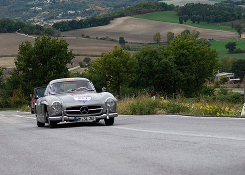 CAGLI , ITALY - OTT 24 - 2020 : MERCEDES-BENZ 300 SL W 198 1954 an old racing car in rally Mille Miglia 2020 the famous italian historical race (1927-1957)