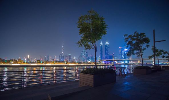 Panorama of skyscrapers of Dubai at night. View of Dubai Greek district