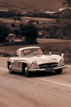 CAGLI , ITALY - OTT 24 - 2020 : MERCEDES-BENZ 300 SL W 198 1955 an old racing car in rally Mille Miglia 2020 the famous italian historical race (1927-1957)