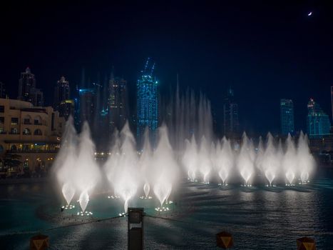 Dancing fountain with lighting in the city at night