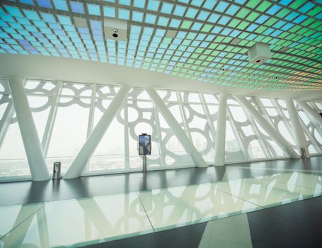The interior of the building with visitors to Dubai Frame