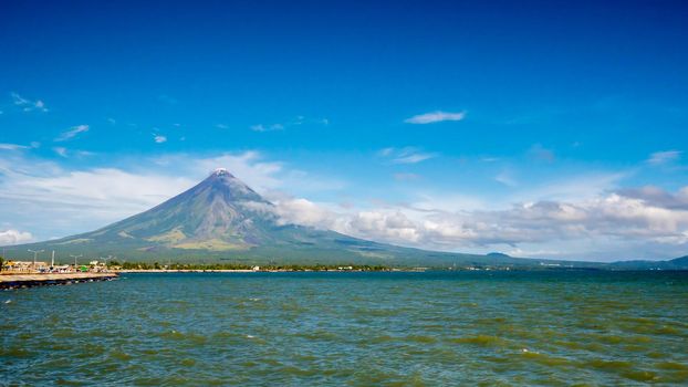 Mayon Volcano is an active stratovolcano in the province of Albay in Bicol Region, on the island of Luzon in the Philippines. Renowned as the perfect cone because of its symmetric conical shape