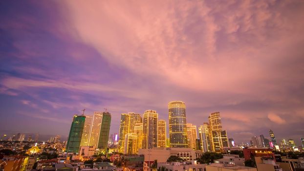 The capital of the Philippines is Manila. Makati city. Beautiful sunset with thunderous powerful clouds