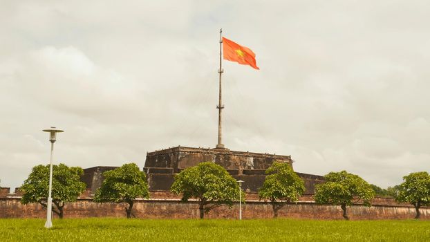 Imperial Royal Palace of Nguyen dynasty in Hue and fkag. Vietnam