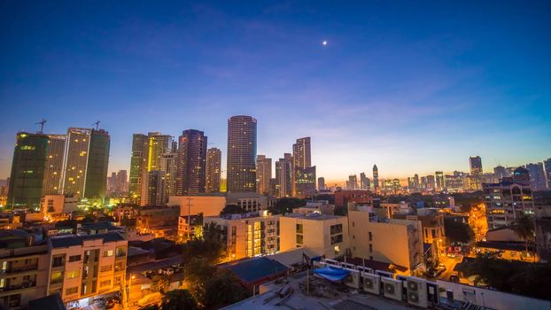 The capital of the Philippines is Manila. Makati city. Early dawn in the city