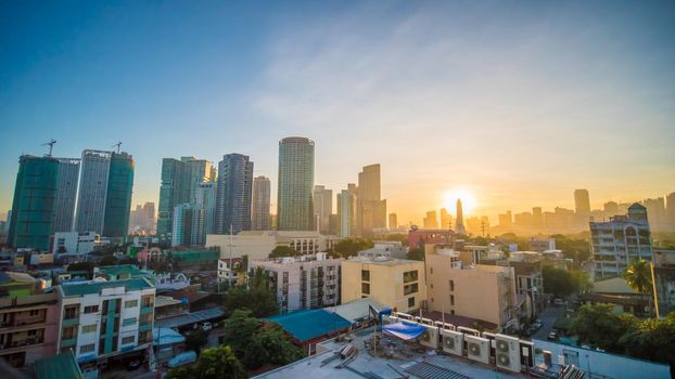 The capital of the Philippines is Manila. Makati city. Early dawn in the city