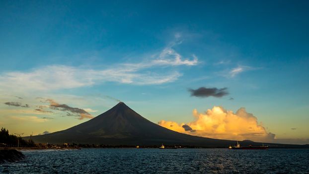 Mayon Volcano is an active stratovolcano in the province of Albay in Bicol Region, on the island of Luzon in the Philippines. Renowned as the perfect cone because of its symmetric conical shape