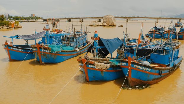 Vietnam. Fishing boats with red flags in Nha Trang