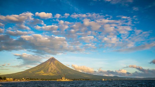 Mayon Volcano is an active stratovolcano in the province of Albay in Bicol Region, on the island of Luzon in the Philippines. Renowned as the perfect cone because of its symmetric conical shape