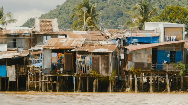 Slums in Nha Trang. Houses on the river