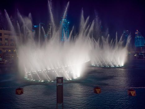 Dancing fountain with lighting in the city at night