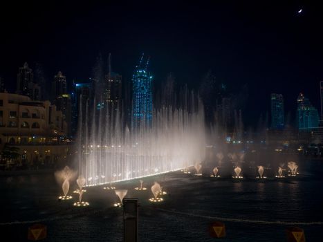 Dancing fountain with lighting in the city at night