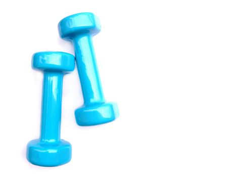 Two blue dumbbells isolated on white background