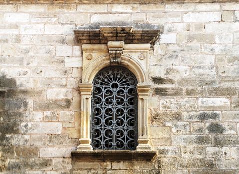 An old church window in Lefkada, Greece